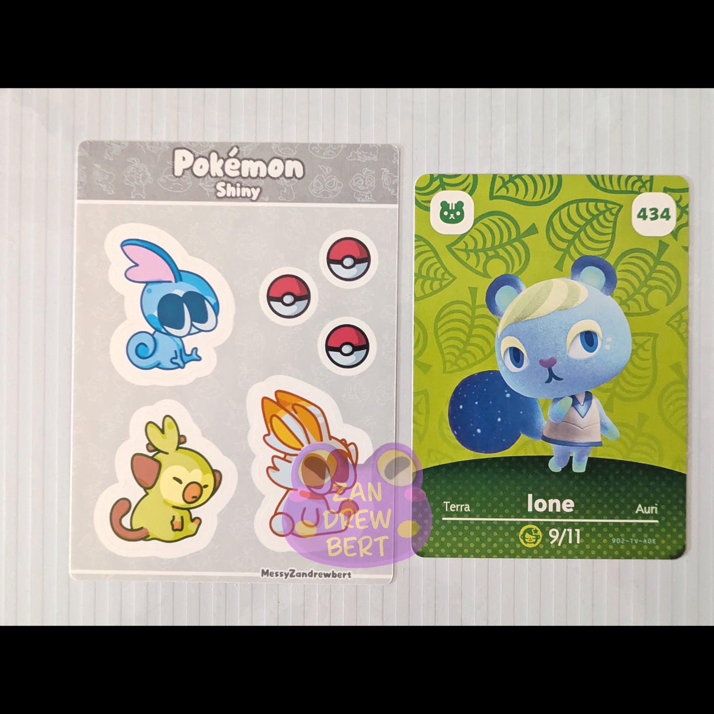 Sticker Sheet next to Animal Crossing Amiibo card for size reference