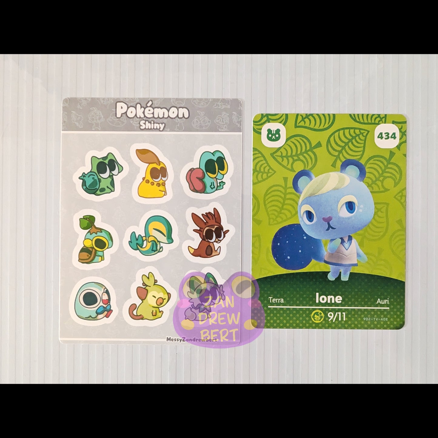 Sticker Sheet next to Animal Crossing Amiibo card for size reference
