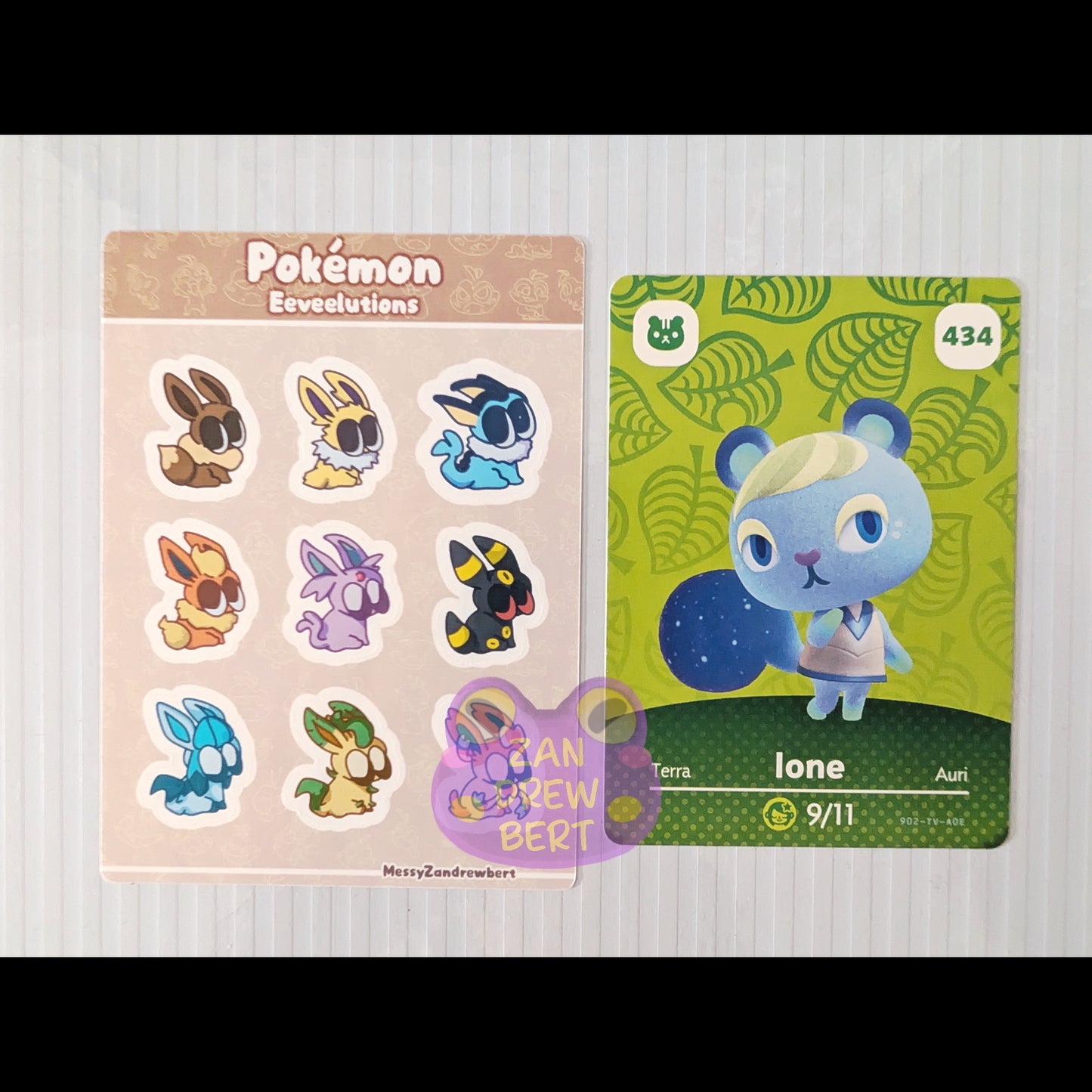Sticker Sheet next to Animal Crossing Amiibo card for size reference