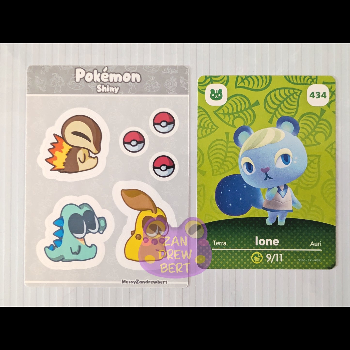 Sticker Sheet next to Animal Crossing Amiibo card for size reference
