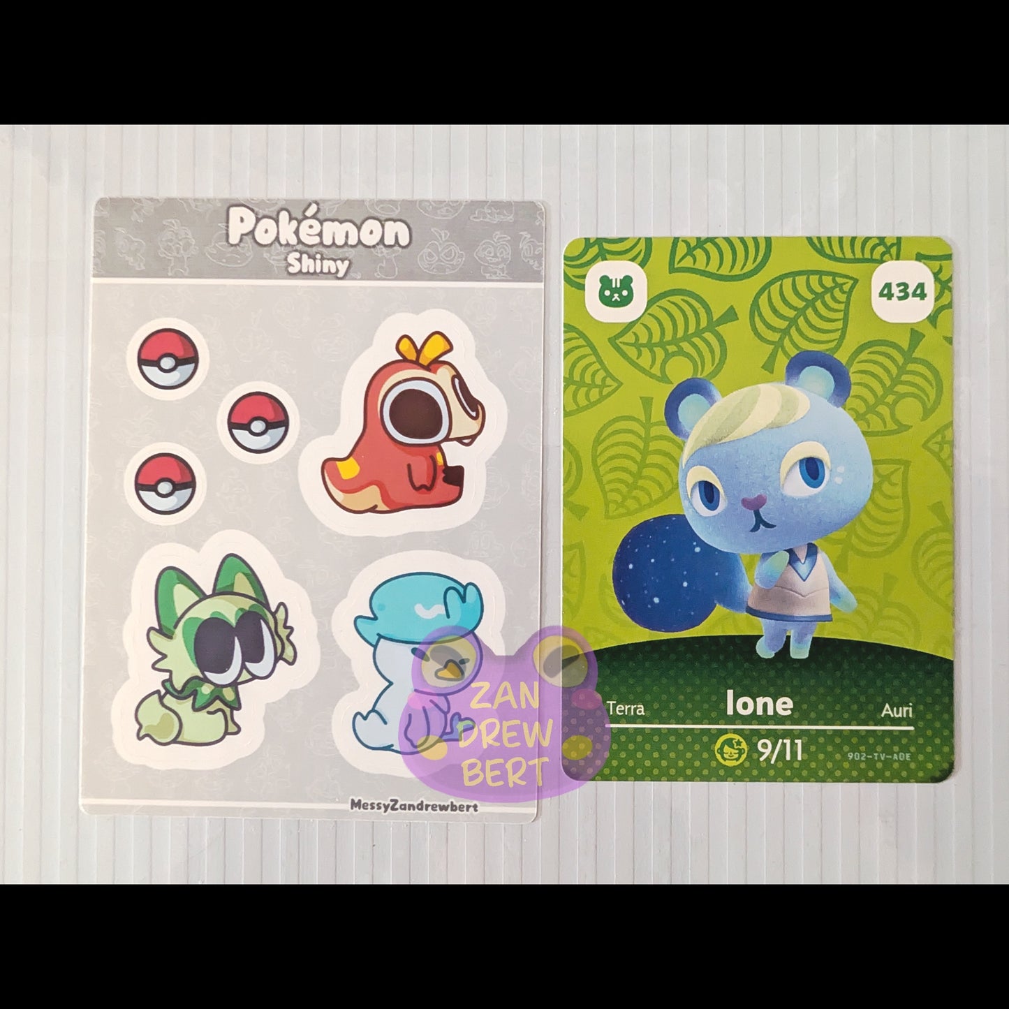 Sticker Sheet next to Animal Crossing Amiibo card for size reference