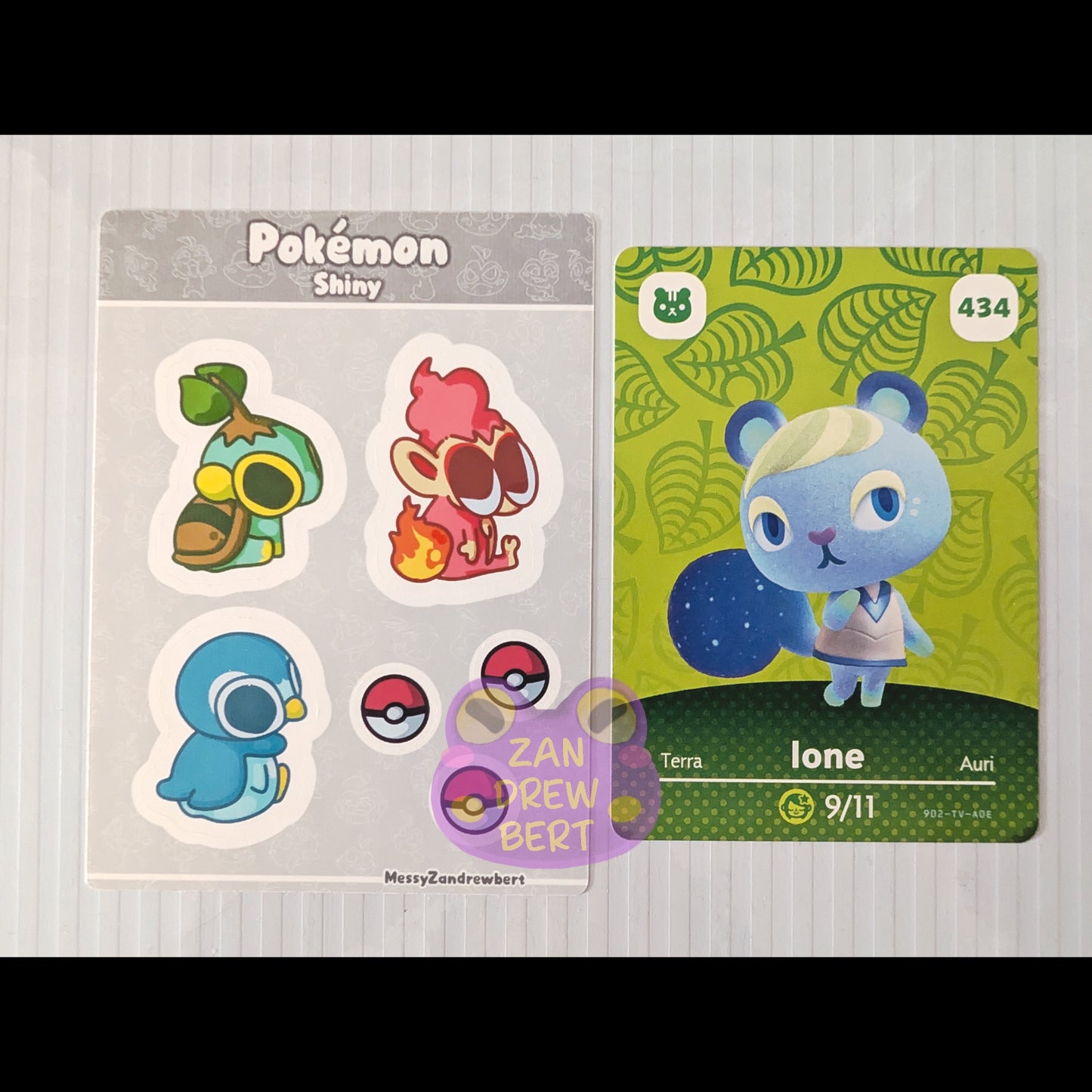 Sticker Sheet next to Animal Crossing Amiibo card for size reference